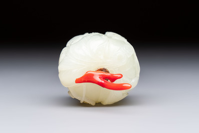 A Chinese carved jade melon-form snuff bottle with a red coral stopper, 1820-1880