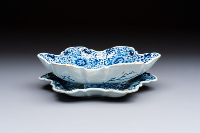 A fine blue and white Dutch Delft strawberry strainer and stand, 18th C.