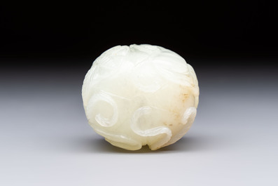 A Chinese carved jade melon-form snuff bottle with a red coral stopper, 1820-1880