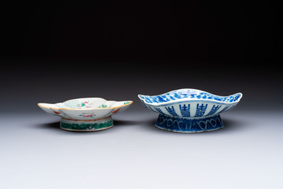 Four Chinese blue, white and famille rose tazzas and a covered spice bowl with bats design, 19th C.