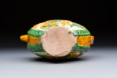 A rare Chinese sancai 'Phoenix' ewer with a wooden box, Liao