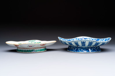 Four Chinese blue, white and famille rose tazzas and a covered spice bowl with bats design, 19th C.