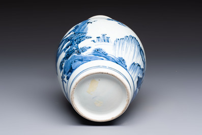 A fine Japanese Arita blue and white vase or sake bottle with landscape design, Edo, ca. 1680