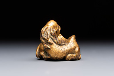 A Chinese gilt bronze 'Camel' paper weight, 19th C.