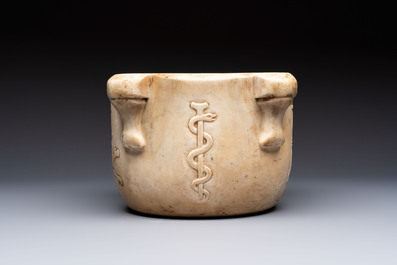 A large Italian carved marble 'Memento Mori' apothecary mortar, 17th C.