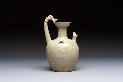 A fine Chinese Yueyao green-glazed chicken-head ewer with dragon-form handle, Southern Dynasties