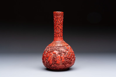 Two Chinese cinnabar lacquer covered boxes and a bottle vase, 19th C.