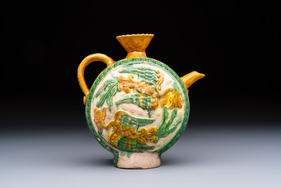 A rare Chinese sancai 'Phoenix' ewer with a wooden box, Liao