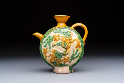A rare Chinese sancai 'Phoenix' ewer with a wooden box, Liao