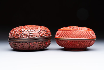 Two Chinese cinnabar lacquer covered boxes and a bottle vase, 19th C.