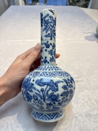 A Chinese blue and white bottle vase with floral design, hare mark, Wanli