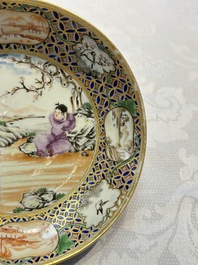 A Chinese famille rose gilt-decorated cup and saucer with figural design, Jiaqing