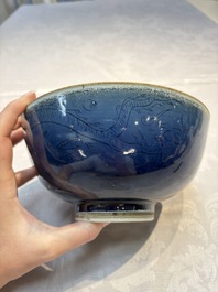 A Chinese blue-glazed 'Hatcher Cargo' bowl with incised dragons, Transitional period