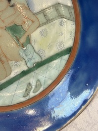 A Chinese famille verte 'Erotic Subject' plate, 19th C.