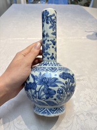 A Chinese blue and white bottle vase with floral design, hare mark, Wanli