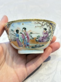 A Chinese famille rose gilt-decorated cup and saucer with figural design, Jiaqing