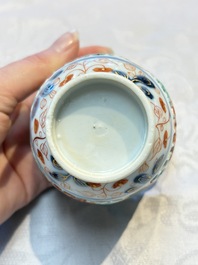 A rare Chinese famille verte reticulated double-walled cup and saucer, artemisia leaf mark, Kangxi