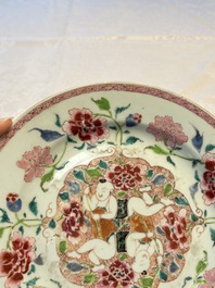 A pair of Chinese famille rose 'He He Er Xian' plates, Yongzheng/Qianlong
