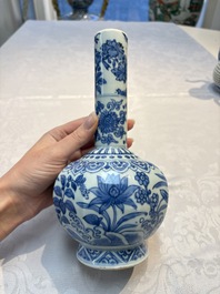 A Chinese blue and white bottle vase with floral design, hare mark, Wanli