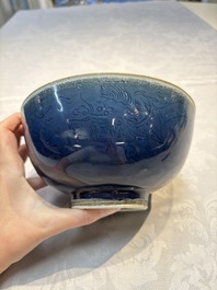 A Chinese blue-glazed 'Hatcher Cargo' bowl with incised dragons, Transitional period
