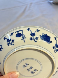 A Chinese blue and white 'Buddhist Symbols' plate, Chenghua mark, Kangxi
