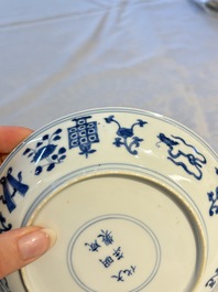 A Chinese blue and white 'Buddhist Symbols' plate, Chenghua mark, Kangxi