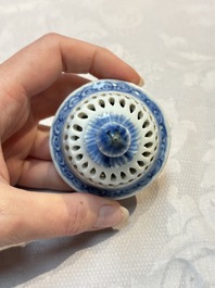 A rare Chinese blue and white reticulated double-walled ewer and cover with floral design, Kangxi