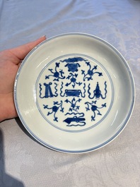 A Chinese blue and white 'Buddhist Symbols' plate, Chenghua mark, Kangxi