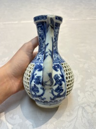 A rare Chinese blue and white reticulated double-walled ewer and cover with floral design, Kangxi