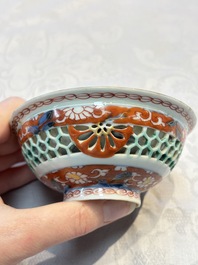 A rare Chinese famille verte reticulated double-walled cup and saucer, artemisia leaf mark, Kangxi