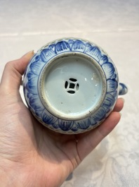 A rare Chinese blue and white reticulated double-walled ewer and cover with floral design, Kangxi