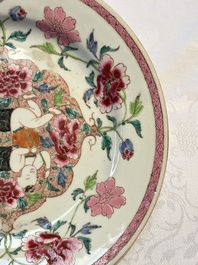 A pair of Chinese famille rose 'He He Er Xian' plates, Yongzheng/Qianlong