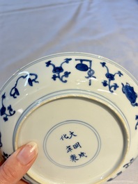 A Chinese blue and white 'Buddhist Symbols' plate, Chenghua mark, Kangxi
