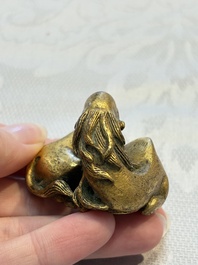 A Chinese gilt bronze 'Camel' paper weight, 19th C.