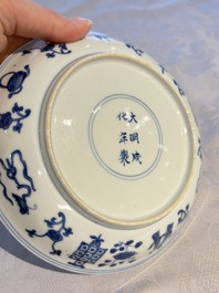 A Chinese blue and white 'Buddhist Symbols' plate, Chenghua mark, Kangxi