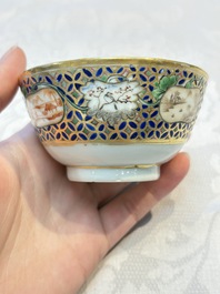 A Chinese famille rose gilt-decorated cup and saucer with figural design, Jiaqing