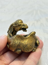 A Chinese gilt bronze 'Camel' paper weight, 19th C.