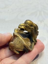 A Chinese gilt bronze 'Camel' paper weight, 19th C.