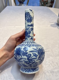 A Chinese blue and white bottle vase with floral design, hare mark, Wanli