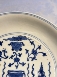 A Chinese blue and white 'Buddhist Symbols' plate, Chenghua mark, Kangxi