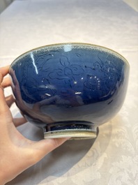 A Chinese blue-glazed 'Hatcher Cargo' bowl with incised dragons, Transitional period