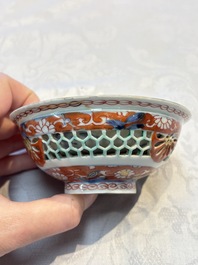 A rare Chinese famille verte reticulated double-walled cup and saucer, artemisia leaf mark, Kangxi
