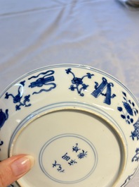 A Chinese blue and white 'Buddhist Symbols' plate, Chenghua mark, Kangxi