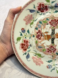 A pair of Chinese famille rose 'He He Er Xian' plates, Yongzheng/Qianlong