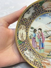 A Chinese famille rose gilt-decorated cup and saucer with figural design, Jiaqing