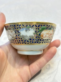 A Chinese famille rose gilt-decorated cup and saucer with figural design, Jiaqing
