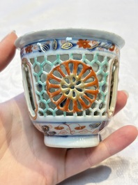 A rare Chinese famille verte reticulated double-walled cup and saucer, artemisia leaf mark, Kangxi