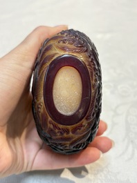 A very large Chinese brown-overlay amber glass 'Ba Xian Zhu Shou 八仙祝壽&lsquo; table snuff bottle, 19th C.