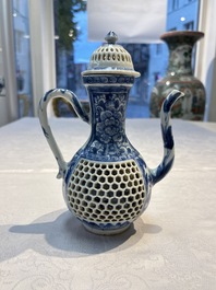 A rare Chinese blue and white reticulated double-walled ewer and cover with floral design, Kangxi