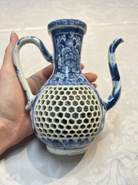 A rare Chinese blue and white reticulated double-walled ewer and cover with floral design, Kangxi